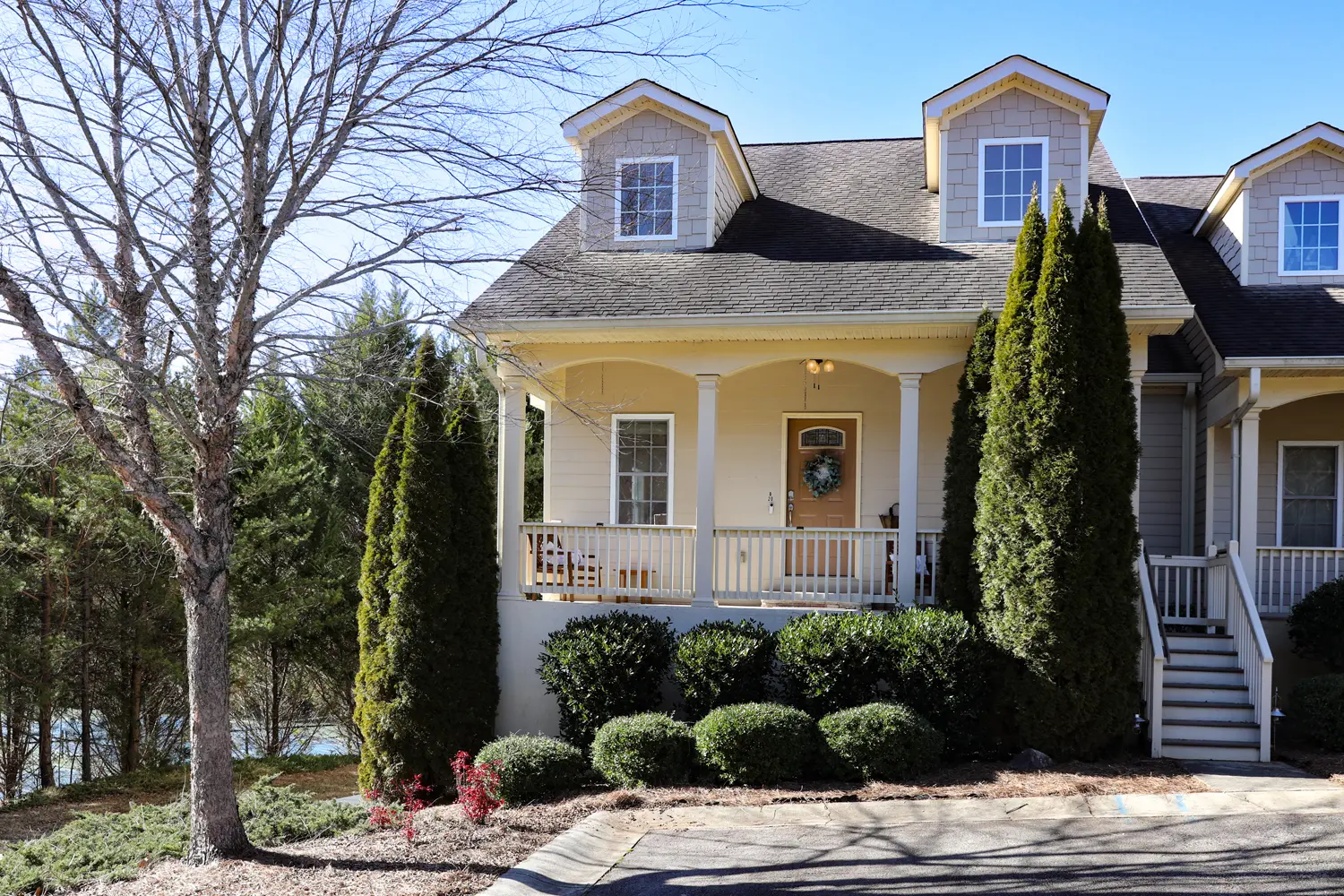 Innsbruck Charming townhome exterior with a covered front balcony in Helen